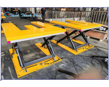 BÀN NÂNG HẠ THỦY LỰC CHỮ E